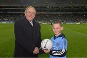 1 March 2014; Donal Bollard, from Allianz, made a special presentation in Croke Park to Killian Doyle, from Ballymun Kickhams GAA Club, Co. Dublin, to mark his outstanding performance during the Allianz Cumann na mBunscol competitions. Allianz Football League, Division 1, Round 3, Dublin v Cork, Croke Park, Dublin. Picture credit: Ray McManus / SPORTSFILE