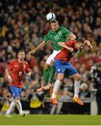 5 March 2014; Jon Walters, Republic of Ireland, in action against Dusan Tadic, Serbia. International Friendly, Republic of Ireland v Serbia, Aviva Stadium, Lansdowne Road, Dublin.  Picture credit: Ramsey Cardy / SPORTSFILE