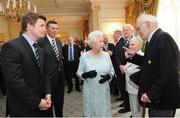 7 May 2009; Her Majesty the Queen is introduced to 1948 Ireland Grand Slam team member Jimmy Nelson, in the company of 2009 team captain Brian O'Driscoll and Philip Browne, Chief Executive of the IRFU, during a Civic Reception for the Ireland rugby squad. Hillsborough Castle, Hillsborough, Co. Down. Picture credit: Oliver McVeigh / SPORTSFILE