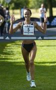 20 August 2005; Pauline Curley, Tullamore AC, crosses the finish line on her way to winning the Women's race in the adidas Frank Duffy 10 Mile Road Race. Phoenix Park, Dublin. Picture credit; Brendan Moran / SPORTSFILE