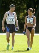 20 August 2005; Men's winner Neil Cusack, Limerick AC, in conversation with Women's winner Pauline Curley, Tullamore Harriers AC, after their victories in the adidas Frank Duffy 10 Mile Road Race. Phoenix Park, Dublin. Picture credit; Brendan Moran / SPORTSFILE