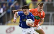29 May 2016; Darragh Kennedy of Cavan in action against Rian O'Neill of Armagh during the Electric Ireland Ulster GAA Football Minor Championship quarter-final between Cavan and Armagh in Kingspan Breffni Park, Cavan. Photo by Oliver McVeigh/Sportsfile