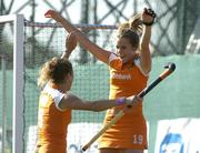 20 August 2005; Ellen Hoog, right, Netherlands, celebrates scoring her sides first goal with team-mate Sylvia Karres. 7th Women's European Nations Hockey Championship Final, Germany v Netherlands, Belfield, UCD, Dublin. Picture credit; Brendan Moran / SPORTSFILE