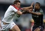19 August 2005; Tommy Bowe, Ulster, is tackled by Delon Armitage, London Irish. Ulster Pre-Season Friendly 2005-2006, Ulster v London Irish, Ravenhill, Belfast. Picture credit; Matt Browne / SPORTSFILE