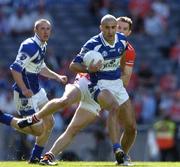 20 August 2005; Barry Brennan, Laois, in action against Paul McGrane, Armagh. Bank of Ireland All-Ireland Senior Football Championship Quarter-Final, Armagh v Laois, Croke Park, Dublin. Picture credit; David Maher / SPORTSFILE