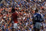 20 August 2005; Darren Rooney, Laois, Ronan Clarke, Armagh look on as spectators watch the match, Bank of Ireland All-Ireland Senior Football Championship Quarter-Final, Armagh v Laois, Croke Park, Dublin. Picture credit; Damien Eagers / SPORTSFILE