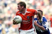 20 August 2005; Francie Bellew, Armagh, in action against Ross Munnelly, Laois. Bank of Ireland All-Ireland Senior Football Championship Quarter-Final, Armagh v Laois, Croke Park, Dublin. Picture credit; Damien Eagers / SPORTSFILE