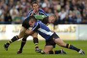 26 August 2005; Darren Fox, Northampton, is tackled by Keith Gleeson and Christian Warner, Leinster. Leinster Pre-Season Friendly 2005-2006, Leinster v Northampton, Donnybrook, Dublin. Picture credit; Pat Murphy / SPORTSFILE