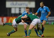 7 March 2014; Alessandro Torlai, Italy, is tackled by Dan Goggin, left, and Peter Robb, Ireland. U20 Six Nations Rugby Championship, Ireland v Italy, Dubarry Park, Athlone, Co. Westmeath. Picture credit: Ramsey Cardy / SPORTSFILE
