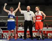 7 March 2014; Paddy Barnes, left, Holy Family Golden Gloves Boxing Club, is declared the winner over Hughie Myers, Ryson Boxing Club, after their 49Kg bout. National Senior Boxing Championship Finals, National Stadium, Dublin. Picture credit: Barry Cregg / SPORTSFILE