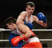 7 March 2014; Tyrone McCullough, left, Holy Family Golden Gloves Boxing Club, exchanges punches with Michael Conlan, St John Bosco Club, during their 56Kg bout. National Senior Boxing Championship Finals, National Stadium, Dublin. Picture credit: Barry Cregg / SPORTSFILE