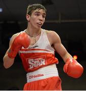 7 March 2014; Michael Conlan, St John Bosco Club, in action against Tyrone McCullough, Holy Family Golden Gloves Boxing Club, during their 56Kg bout. National Senior Boxing Championship Finals, National Stadium, Dublin. Picture credit: Barry Cregg / SPORTSFILE