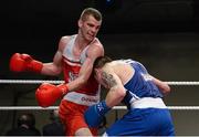 7 March 2014; Adam Nolan, left, Bray Boxing Club, exchanges punches with Stephen Donnelly, All Saints Boxing Club, during their 69Kg bout. National Senior Boxing Championship Finals, National Stadium, Dublin. Picture credit: Barry Cregg / SPORTSFILE