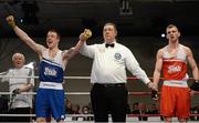 7 March 2014; Stephen Donnelly, left, All Saints Boxing Club, is declared the winner over Adam Nolan, Bray Boxing Club, after their 69Kg bout. National Senior Boxing Championship Finals, National Stadium, Dublin. Picture credit: Barry Cregg / SPORTSFILE