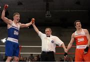 7 March 2014; Michael O'Reilly, left, Portlaoise Boxing Club, is declared the winner over Darren O'Neill, Paulstown Boxing Club, after their 75Kg bout. National Senior Boxing Championship Finals, National Stadium, Dublin. Picture credit: Barry Cregg / SPORTSFILE