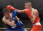 7 March 2014; Chris Phelan, left, Ryston Club, exchanges punches with Adam Courtney, St Marys Dublin Boxing Club, during their 52Kg bout. National Senior Boxing Championship Finals, National Stadium, Dublin. Picture credit: Barry Cregg / SPORTSFILE