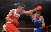 7 March 2014; Michael Nevin, left, Portlaoise Boxing Club, exchanges punches with Dean Walsh, St Josephs / St Ibars Boxing Club, during their 64Kg bout. National Senior Boxing Championship Finals, National Stadium, Dublin. Picture credit: Barry Cregg / SPORTSFILE