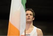 7 March 2014; Olympic boxer Darren O'Neill holds the national flag before the playing of the National Anthem. National Senior Boxing Championship Finals, National Stadium, Dublin. Picture credit: Barry Cregg / SPORTSFILE