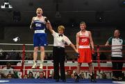 7 March 2014; Dean Walsh, left, St Josephs / St Ibars Boxing Club, is declared the winner over Michael Nevin, Portlaoise Boxing Club, after their 64Kg bout. National Senior Boxing Championship Finals, National Stadium, Dublin. Picture credit: Barry Cregg / SPORTSFILE