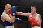 7 March 2014; Gary Sweeney, right, Olympic Boxing Club, exchanges punches with Stephen Ward, Monkstown Antrim Boxing Club, during their 91Kg bout. National Senior Boxing Championship Finals, National Stadium, Dublin. Picture credit: Barry Cregg / SPORTSFILE