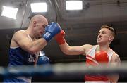 7 March 2014; Gary Sweeney, right, Olympic Boxing Club, exchanges punches with Stephen Ward, Monkstown Antrim Boxing Club, during their 91Kg bout. National Senior Boxing Championship Finals, National Stadium, Dublin. Picture credit: Barry Cregg / SPORTSFILE