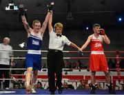 7 March 2014; Dean Walsh, left, St Josephs / St Ibars Boxing Club, is declared the winner over Michael Nevin, Portlaoise Boxing Club, after their 64Kg bout. National Senior Boxing Championship Finals, National Stadium, Dublin. Picture credit: Barry Cregg / SPORTSFILE