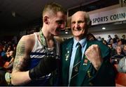 7 March 2014; Dean Walsh, left, St Josephs / St Ibars Boxing Club, with his grandfather Liam Walsh, after his victory over Michael Nevin, Portlaoise Boxing Club, in their 64Kg bout. National Senior Boxing Championship Finals, National Stadium, Dublin. Picture credit: Barry Cregg / SPORTSFILE