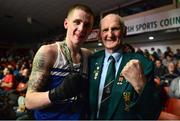 7 March 2014; Dean Walsh, left, St Josephs / St Ibars Boxing Club, with his grandfather Liam Walsh, after his victory over Michael Nevin, Portlaoise Boxing Club, in their 64Kg bout. National Senior Boxing Championship Finals, National Stadium, Dublin. Picture credit: Barry Cregg / SPORTSFILE