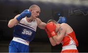 7 March 2014; Stephen Ward, left, Monkstown Antrim Boxing Club, exchanges punches with Gary Sweeney, Olympic Boxing Club, during their 91Kg bout. National Senior Boxing Championship Finals, National Stadium, Dublin. Picture credit: Barry Cregg / SPORTSFILE