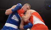 7 March 2014; Dean Gardiner, left, Clonmel Boxing Club, exchanges punches with Con Sheehan, Clonmel Boxing Club, during their 91+Kg bout. National Senior Boxing Championship Finals, National Stadium, Dublin. Picture credit: Barry Cregg / SPORTSFILE