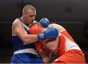 7 March 2014; Dean Gardiner, left, Clonmel Boxing Club, exchanges punches with Con Sheehan, Clonmel Boxing Club, during their 91+Kg bout. National Senior Boxing Championship Finals, National Stadium, Dublin. Picture credit: Barry Cregg / SPORTSFILE