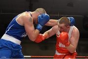 7 March 2014; Con Sheehan, right, Clonmel Boxing Club, exchanges punches with Dean Gardiner, Clonmel Boxing Club, during their 91+Kg bout. National Senior Boxing Championship Finals, National Stadium, Dublin. Picture credit: Barry Cregg / SPORTSFILE