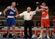 7 March 2014; Con Sheehan, right, Clonmel Boxing Club, is declared the winner over Dean Gardiner, Clonmel Boxing Club, in their 91+Kg bout. National Senior Boxing Championship Finals, National Stadium, Dublin. Picture credit: Barry Cregg / SPORTSFILE