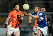 8 March 2014; Aaron Findon, Armagh, in action against Billy Sheehan, Laois. Allianz Football League Division 1 Round 4, Armagh v Laois, Athletic Grounds, Armagh. Picture credit: Oliver McVeigh / SPORTSFILE