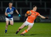 8 March 2014; Caolan Rafferty, Armagh, in action against Peter O'Leary, Laois. Allianz Football League Division 1 Round 4, Armagh v Laois, Athletic Grounds, Armagh. Picture credit: Oliver McVeigh / SPORTSFILE