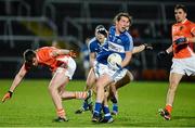 8 March 2014; Darren Strong, Laois, in action against Ethan Rafferty, Armagh. Allianz Football League Division 1 Round 4, Armagh v Laois, Athletic Grounds, Armagh. Picture credit: Oliver McVeigh / SPORTSFILE