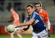 8 March 2014; David Conway, Laois, in action against Paul Hughes, Armagh. Allianz Football League Division 1 Round 4, Armagh v Laois, Athletic Grounds, Armagh. Picture credit: Oliver McVeigh / SPORTSFILE