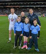 8 March 2014; Referee Marty Duffy with the Kildare captain Eoghan O'Flaherty and Dublin captain Stephen Cluxton with mascots Dara O'Grady, St Brigids, Katelyn Clarke, Scoil Mhuire, Lucan, and Cathal O'Grady, St Brigids, Killester, before the game. Allianz Football League, Division 1, Round 4, Dublin v Kildare, Croke Park, Dublin. Picture credit: Ray McManus / SPORTSFILE