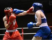 8 March 2014; Dervla Duffy, red, exchanges punches with Michela Walsh, blue, during their 54 Kg bout. National Senior Women's Boxing Championship Finals, National Stadium, Dublin. Picture credit: Matt Browne / SPORTSFILE