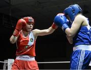 8 March 2014; Cheyanne O'Neill, red, exchanges punches with Amy Broadhurst, blue, during their 60 Kg bout. National Senior Women's Boxing Championship Finals, National Stadium, Dublin. Picture credit: Matt Browne / SPORTSFILE