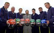 23 August 2005; Azzurri today promoted their hurling helmet. The Azzurri CE marked helmet design was developed with the assistance of county players and the GPA. At the promotion are President of the GAA Sean Kelly with county hurlers, from left, Brian Lohan, Clare, Brian McFall, Antrim, Diarmuid Fitzgerald, Tipperary, Barry Tehan, Offaly, Paul Flynn, Waterford, and Eddie Brennan, Kilkenny. Croke Park, Dublin. Picture credit; Brian Lawless / SPORTSFILE