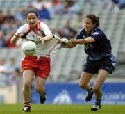 27 August 2005; Gemma Begley, Tyrone, in action against Louise Keegan, Dublin. TG4 Ladies Football All-Ireland Quarter-Final, Dublin v Tyrone, Croke Park, Dublin. Picture credit; Damien Eagers / SPORTSFILE