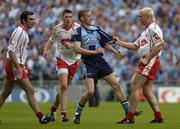27 August 2005; Stephen O'Shaughnessy, Dublin, tussles with Tyrone's Owen Mulligan after the referee's whistle for half time. Bank of Ireland All-Ireland Senior Football Championship Quarter-Final Replay, Dublin v Tyrone, Croke Park, Dublin. Picture credit; Damien Eagers / SPORTSFILE