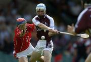 27 August 2005; Aongus Callanan, Galway, scores his sides first goal despite the attentions of Darragh McSweeney, Cork. Erin U21 Hurling Championship Semi-Final, Galway v Cork, Gaelic Grounds, Limerick. Picture credit; Brendan Moran / SPORTSFILE