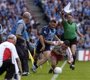 27 August 2005; Senan Connell, Dublin, tussles to keep the ball in play despite the attention of Conor Gormley, Tyrone. Bank of Ireland All-Ireland Senior Football Championship Quarter-Final Replay, Dublin v Tyrone, Croke Park, Dublin. Picture credit; David Maher / SPORTSFILE