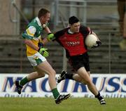 27 August 2005; Martin Clarke, Down, in action against Rory Connor, Offaly. Minor Football Championship Semi-Final, Down v Offaly, Pairc Tailteann, Navan, Co. Meath. Picture credit; Pat Murphy / SPORTSFILE