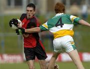 27 August 2005; Gerard McCartan, Down, in action against Diarmuid Horan, Offaly. Minor Football Championship Semi-Final, Down v Offaly, Pairc Tailteann, Navan, Co. Meath. Picture credit; Pat Murphy / SPORTSFILE