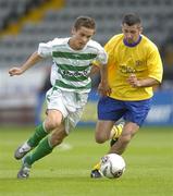 28 August 2005; Lee Roche, Shamrock Rovers, in action against Paddy O'Keeffe, Douglas Hall. FAI Carlsberg Cup 3rd Round, Shamrock Rovers v Douglas Hall, Dalymount Park, Dublin. Picture credit; Brian Lawless / SPORTSFILE