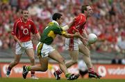 28 August 2005; Philip Clifford, Cork, supported by team-mate James Masters, left, in action against Aidan O'Mahony, Kerry. Bank of Ireland All-Ireland Senior Football Championship Semi-Final, Kerry v Cork, Croke Park, Dublin. Picture credit; Brendan Moran / SPORTSFILE
