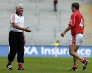 28 August 2005; Cork manager Billy Morgan, left, shakes hands with Niall Geary, after he was substituted early on in the first half. Bank of Ireland All-Ireland Senior Football Championship Semi-Final, Kerry v Cork, Croke Park, Dublin. Picture credit; David Maher / SPORTSFILE